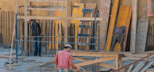 Men Working in a Building Under Construction