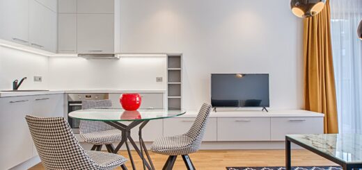 Clear Glass-top Table Near Flat Screen Television