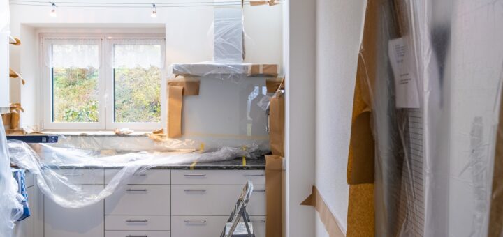 white wooden cabinet near window