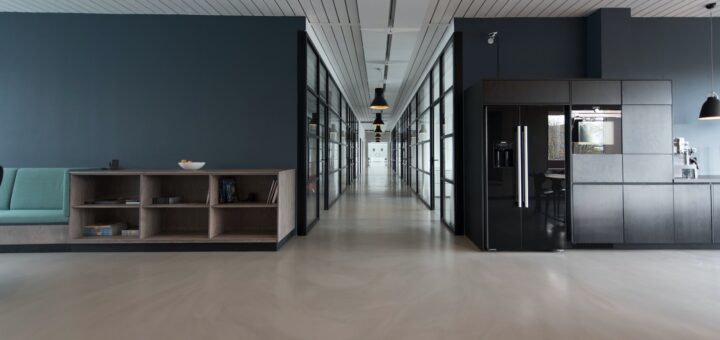 architectural photography of black and brown hallway